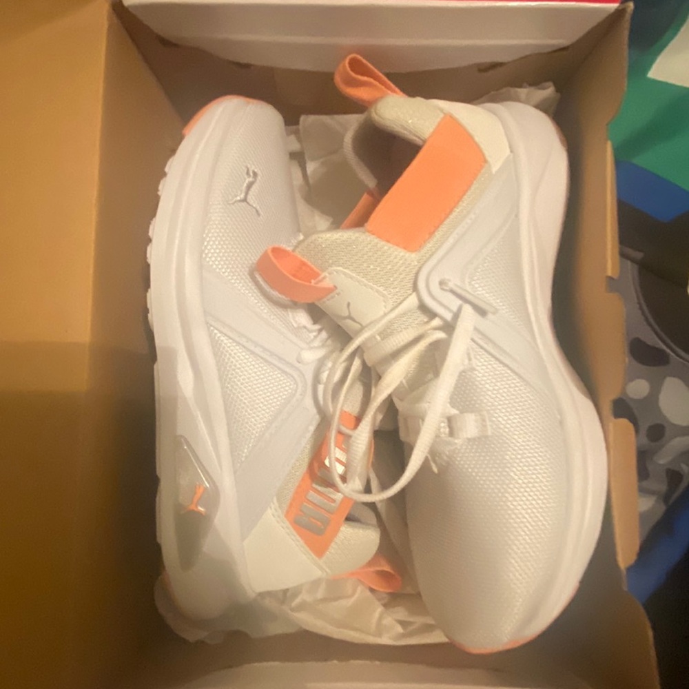 Coral(Pink) & White Puma Runners ..
Size 5.5Y or 7 Women’s